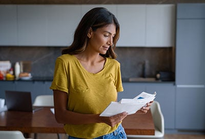 woman-looking-at-bill